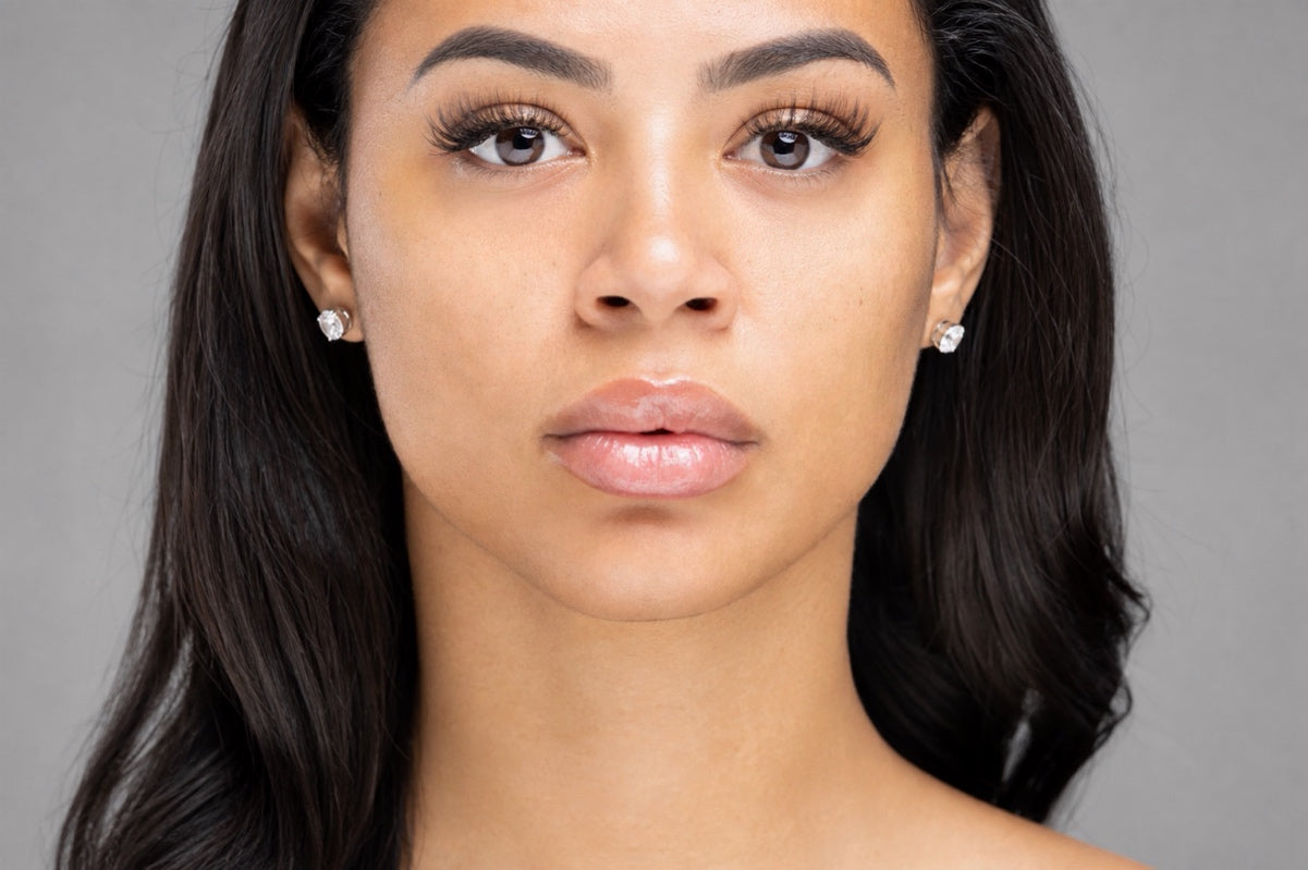 RENIVE founder wearing glossy lip balm